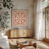 Hacienda Tile II Bright Orange by Moira Hershey. Shown in a natural wood frame in a cozy modern living room. Available as an archival giclee rolled canvas, fine art paper, or poster print. SKU 37021a.
