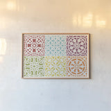 Hacienda Tile VII by Moira Hershey. shown as a paper print in a natural frame. Available as a archival giclee rolled canvas, fine art paper, or poster print. SKU 34618i.