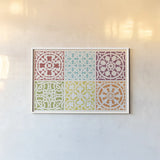 Hacienda Tile VII by Moira Hershey. shown as a paper print in a white frame. Available as a archival giclee rolled canvas, fine art paper, or poster print. SKU 34618i.