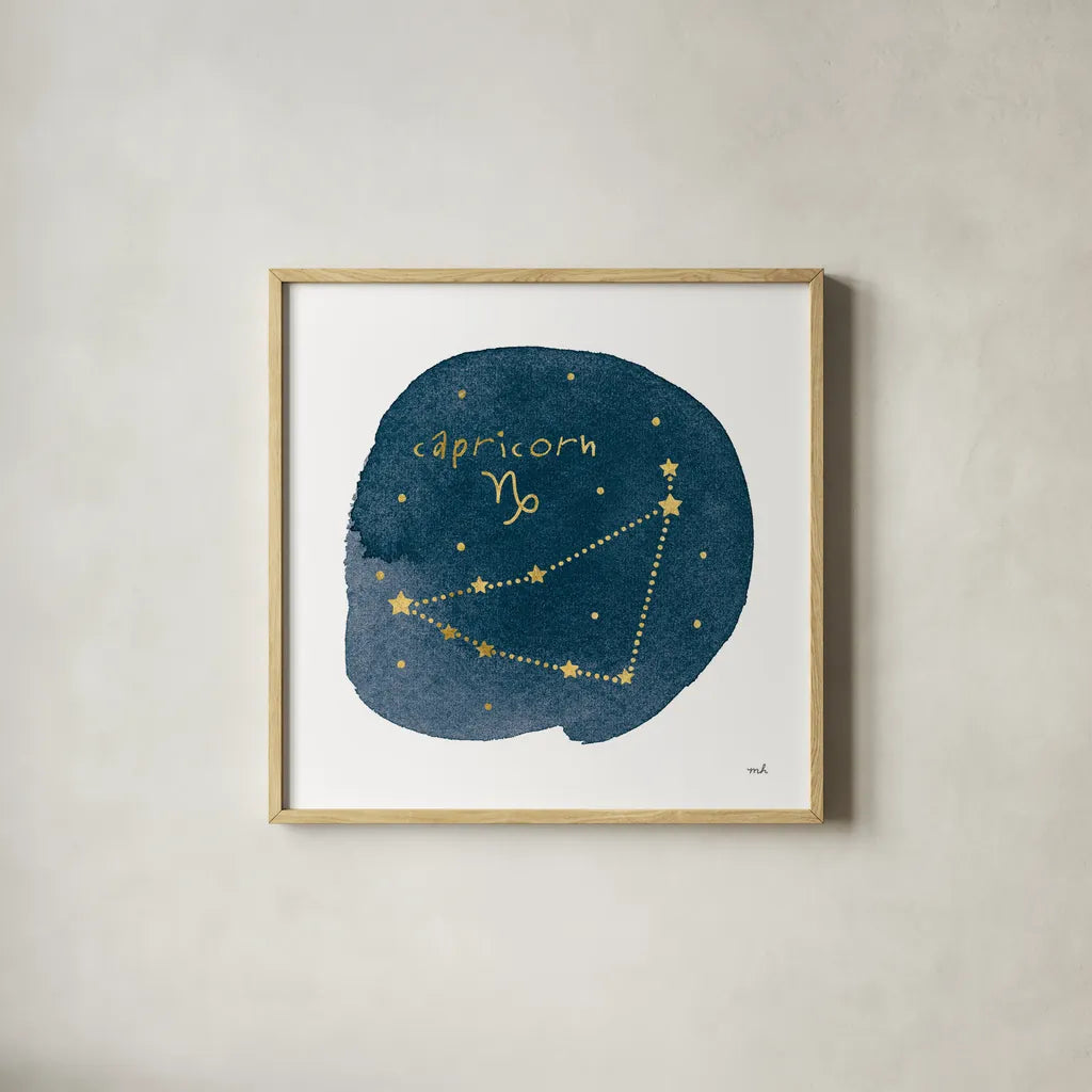 Horoscope Capricorn by Moira Hershey. Shown in a natural wood glass frame for a timeless modern aesthetic. Available as an archival giclee rolled canvas, fine art paper, or poster print. SKU 48901a.