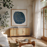 Horoscope Gemini by Moira Hershey. Shown in a natural wood frame in a cozy modern living room. Available as an archival giclee rolled canvas, fine art paper, or poster print. SKU 48902a.