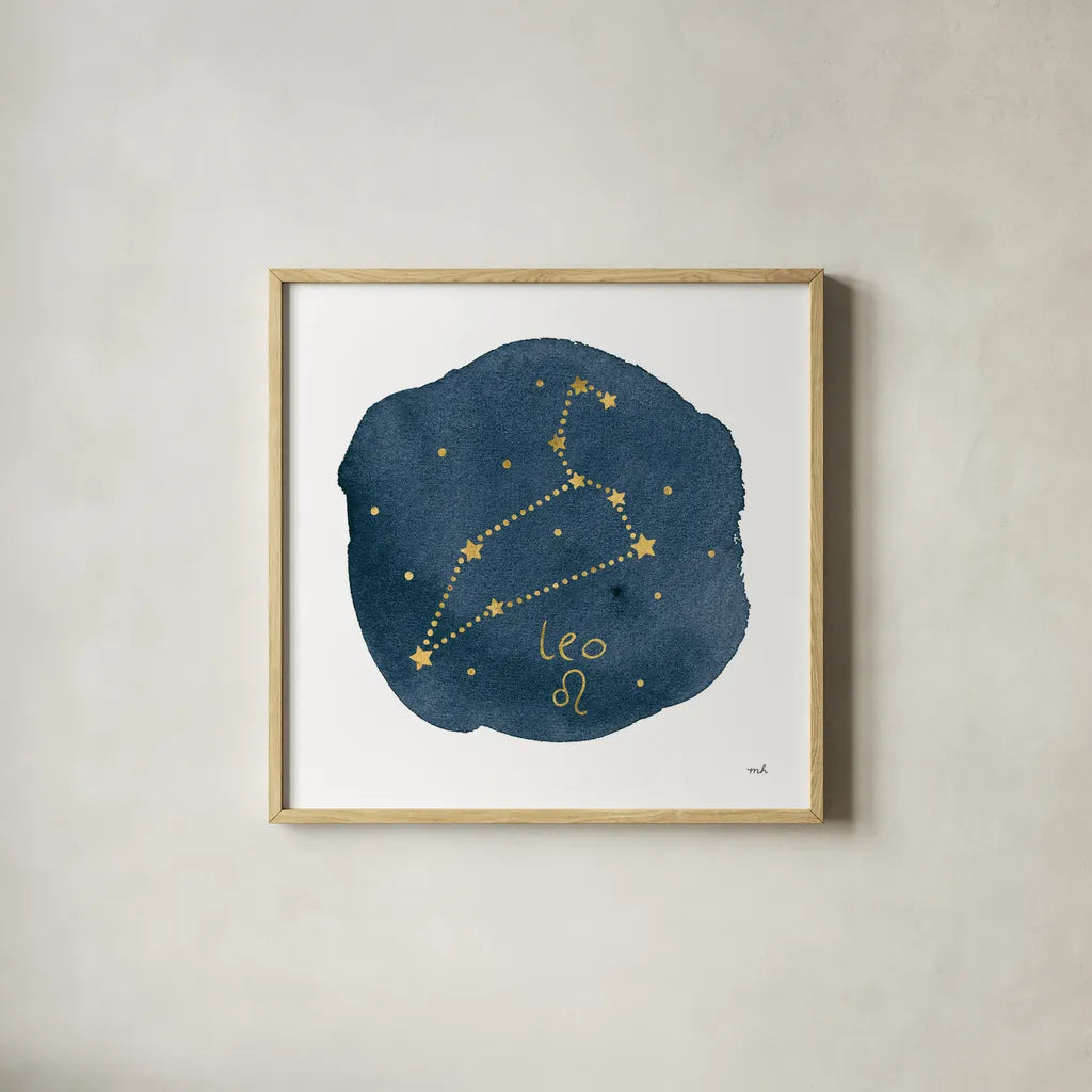 Horoscope Leo by Moira Hershey. Shown in a natural wood glass frame for a timeless modern aesthetic. Available as an archival giclee rolled canvas, fine art paper, or poster print. SKU 48903a.