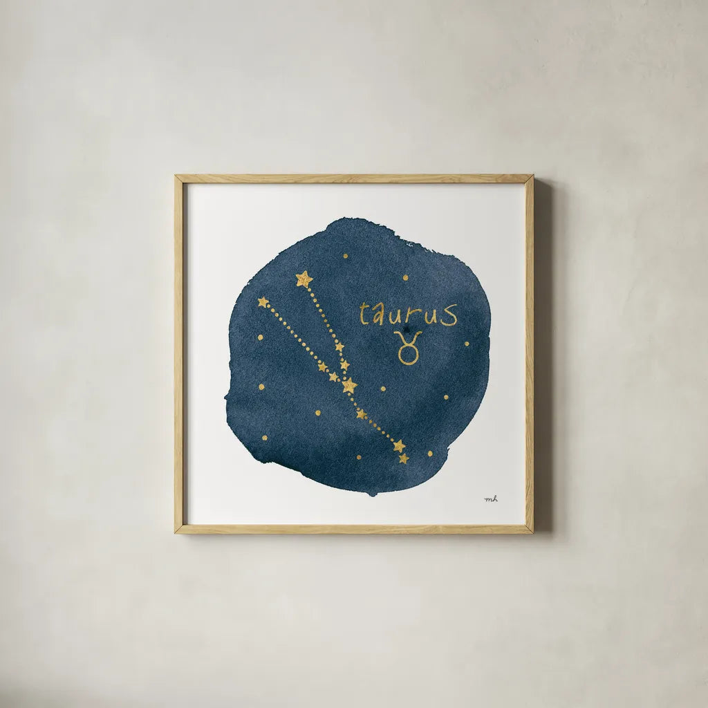 Horoscope Taurus by Moira Hershey. Shown in a natural wood glass frame for a timeless modern aesthetic. Available as an archival giclee rolled canvas, fine art paper, or poster print. SKU 48908a.