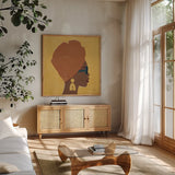 Kenya Couture I by Moira Hershey. Shown in a natural wood frame in a cozy modern living room. Available as an archival giclee rolled canvas, fine art paper, or poster print. SKU 62162a.