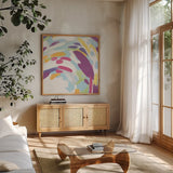 Laughter II Bright by Moira Hershey. Shown in a natural wood frame in a cozy modern living room. Available as an archival giclee rolled canvas, fine art paper, or poster print. SKU 56828a.