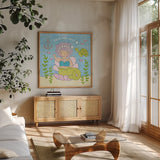 Magical Mermaid III by Moira Hershey. Shown in a natural wood frame in a cozy modern living room. Available as an archival giclee rolled canvas, fine art paper, or poster print. SKU 29822a.