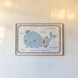 Nautical Friends Whale of a Time by Moira Hershey. shown as a paper print in a natural frame. Available as a archival giclee rolled canvas, fine art paper, or poster print. SKU 38384i.