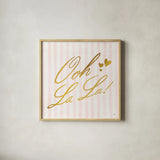 Ooh La La by Moira Hershey. Shown in a natural wood glass frame for a timeless modern aesthetic. Available as an archival giclee rolled canvas, fine art paper, or poster print. SKU 26194a.