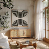 Over the Rainbow BW I by Moira Hershey. Shown in a natural wood frame in a cozy modern living room. Available as an archival giclee rolled canvas, fine art paper, or poster print. SKU 53531a.