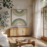 Over the Rainbow I Cabana by Moira Hershey. Shown in a natural wood frame in a cozy modern living room. Available as an archival giclee rolled canvas, fine art paper, or poster print. SKU 68246a.
