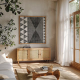 Patterns of the Savanna II BW by Moira Hershey. Shown in a natural wood frame in a cozy modern living room. Available as an archival giclee rolled canvas, fine art paper, or poster print. SKU 38417a.