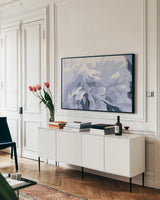 Peony Delight by Moira Hershey. shown as a framed stretched canvas in a living room above a console. Available as a archival giclee rolled canvas, fine art paper, or poster print. SKU 46689i.
