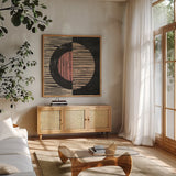 Primitive I Terra Cotta by Moira Hershey. Shown in a natural wood frame in a cozy modern living room. Available as an archival giclee rolled canvas, fine art paper, or poster print. SKU 59456a.