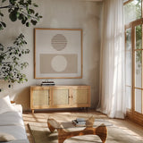 Reflection II Neutral by Moira Hershey. Shown in a natural wood frame in a cozy modern living room. Available as an archival giclee rolled canvas, fine art paper, or poster print. SKU 68119a.
