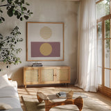 Reflection II Yellow by Moira Hershey. Shown in a natural wood frame in a cozy modern living room. Available as an archival giclee rolled canvas, fine art paper, or poster print. SKU 66737a.