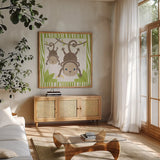 Safari Fun Monkey by Moira Hershey. Shown in a natural wood frame in a cozy modern living room. Available as an archival giclee rolled canvas, fine art paper, or poster print. SKU 19926a.