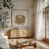 Spring Nest II Home by Moira Hershey. Shown in a natural wood frame in a cozy modern living room. Available as an archival giclee rolled canvas, fine art paper, or poster print. SKU 71348a.