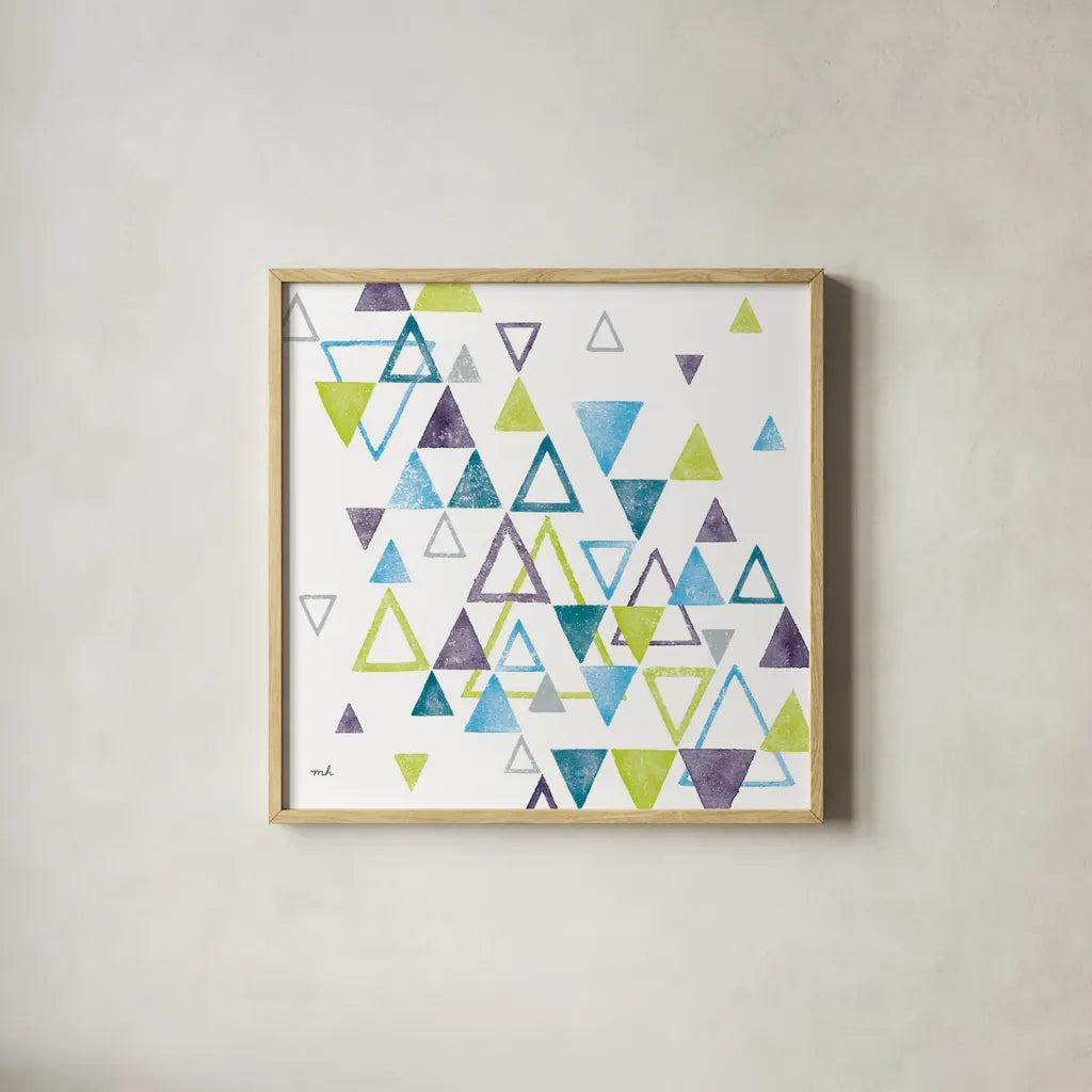 Triangle Tumble I by Moira Hershey. Shown in a natural wood glass frame for a timeless modern aesthetic. Available as an archival giclee rolled canvas, fine art paper, or poster print. SKU 20031a.