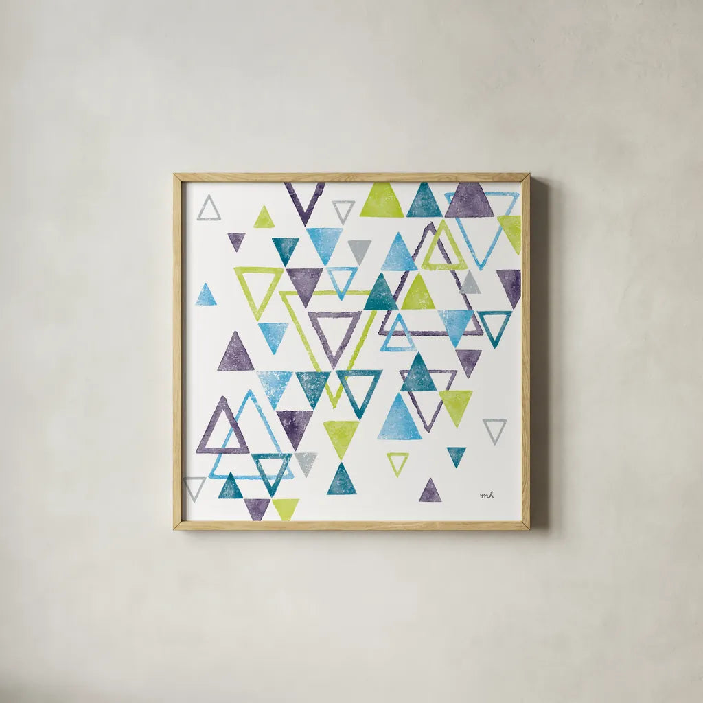 Triangle Tumble II by Moira Hershey. Shown in a natural wood glass frame for a timeless modern aesthetic. Available as an archival giclee rolled canvas, fine art paper, or poster print. SKU 20032a.