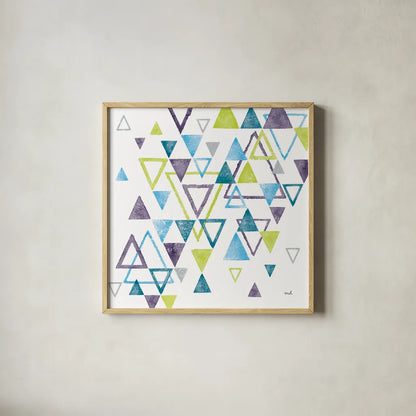 Triangle Tumble II by Moira Hershey. Shown in a natural wood glass frame for a timeless modern aesthetic. Available as an archival giclee rolled canvas, fine art paper, or poster print. SKU 20032a.
