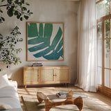 Tropical Treasures II Blue Green by Moira Hershey. Shown in a natural wood frame in a cozy modern living room. Available as an archival giclee rolled canvas, fine art paper, or poster print. SKU 56368a.