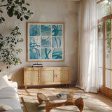 Underwater by Moira Hershey. Shown in a natural wood frame in a cozy modern living room. Available as an archival giclee rolled canvas, fine art paper, or poster print. SKU 46603a.
