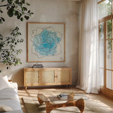 Watercolor Floral II by Moira Hershey. Shown in a natural wood frame in a cozy modern living room. Available as an archival giclee rolled canvas, fine art paper, or poster print. SKU 12372a.