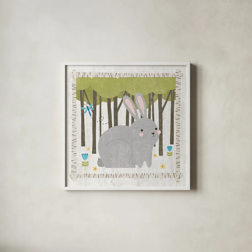 Woodland Hideaway Bunny by Moira Hershey. Shown in a crisp white glass frame for a clean and minimalist style. Available as an archival giclee rolled canvas, fine art paper, or poster print. SKU 25587a.
