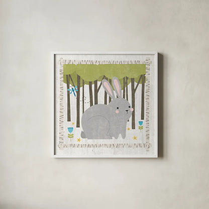Woodland Hideaway Bunny by Moira Hershey. Shown in a crisp white glass frame for a clean and minimalist style. Available as an archival giclee rolled canvas, fine art paper, or poster print. SKU 25587a.