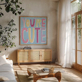 Words of Love IV by Moira Hershey. Shown in a natural wood frame in a cozy modern living room. Available as an archival giclee rolled canvas, fine art paper, or poster print. SKU 31359a.