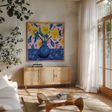 Dandilions by Morgan Birch. Shown in a natural wood frame in a cozy modern living room. Available as an archival giclee rolled canvas, fine art paper, or poster print. SKU 104015a.