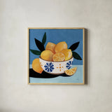 Lifes Bowl of Lemons by Morgan Birch. Shown in a natural wood glass frame for a timeless modern aesthetic. Available as an archival giclee rolled canvas, fine art paper, or poster print. SKU 103133a.