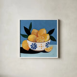 Lifes Bowl of Lemons by Morgan Birch. Shown in a crisp white glass frame for a clean and minimalist style. Available as an archival giclee rolled canvas, fine art paper, or poster print. SKU 103133a.