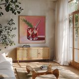 Little Cocktail With Herb by Morgan Birch. Shown in a natural wood frame in a cozy modern living room. Available as an archival giclee rolled canvas, fine art paper, or poster print. SKU 103137a.