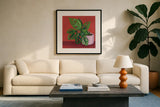 Monstera Study by Morgan Birch. Displayed in a glass frame with matte in a clean modern living room. Available as an archival giclee rolled canvas, fine art paper, or poster print. SKU 103115a.