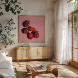 Sliced Tomatoes Study by Morgan Birch. Shown in a natural wood frame in a cozy modern living room. Available as an archival giclee rolled canvas, fine art paper, or poster print. SKU 103132a.