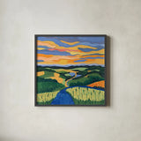 Sunset Over Rolling Hills by Morgan Birch. Shown in a sleek black glass frame for a contemporary gallery look. Available as an archival giclee rolled canvas, fine art paper, or poster print. SKU 103114a.
