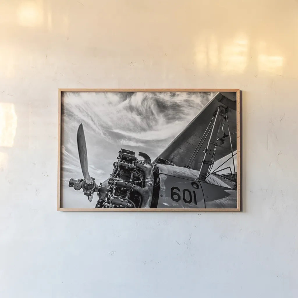 Aero Maquina Big Yellow BW by Nathan Larson. shown as a paper print in a natural frame. Available as a archival giclee rolled canvas, fine art paper, or poster print. SKU 73110i.