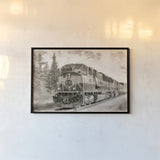 Alaskan Railroad in Denali by Nathan Larson. shown as a paper print in a black flame. Available as a archival giclee rolled canvas, fine art paper, or poster print. SKU 94124i.