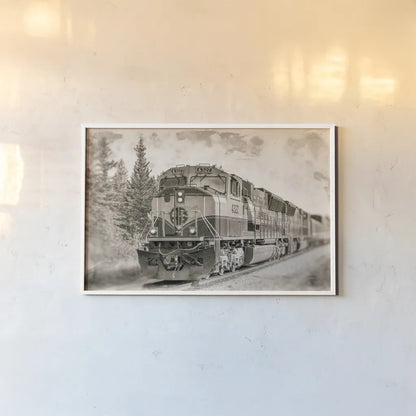 Alaskan Railroad in Denali by Nathan Larson. shown as a paper print in a white frame. Available as a archival giclee rolled canvas, fine art paper, or poster print. SKU 94124i.