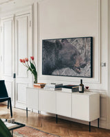 Alberta Black Bear Tones by Nathan Larson. shown as a framed stretched canvas in a living room above a console. Available as a archival giclee rolled canvas, fine art paper, or poster print. SKU 100750i.
