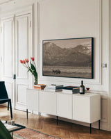 American Icon Sepia by Nathan Larson. shown as a framed stretched canvas in a living room above a console. Available as a archival giclee rolled canvas, fine art paper, or poster print. SKU 92469i.