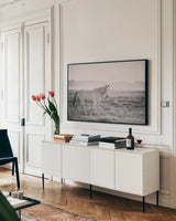 And Then All Was Quiet by Nathan Larson. shown as a framed stretched canvas in a living room above a console. Available as a archival giclee rolled canvas, fine art paper, or poster print. SKU 95333i.