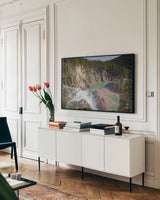 Approaching by Nathan Larson. shown as a framed stretched canvas in a living room above a console. Available as a archival giclee rolled canvas, fine art paper, or poster print. SKU 82408i.