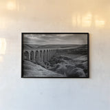 Aqueduct IV by Nathan Larson. shown as a paper print in a black flame. Available as a archival giclee rolled canvas, fine art paper, or poster print. SKU 89237i.
