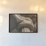 Arch Angles I by Nathan Larson. shown as a paper print in a black flame. Available as a archival giclee rolled canvas, fine art paper, or poster print. SKU 87726i.