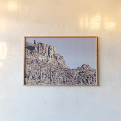 Arizona Dreams by Nathan Larson. shown as a paper print in a natural frame. Available as a archival giclee rolled canvas, fine art paper, or poster print. SKU 90479i.