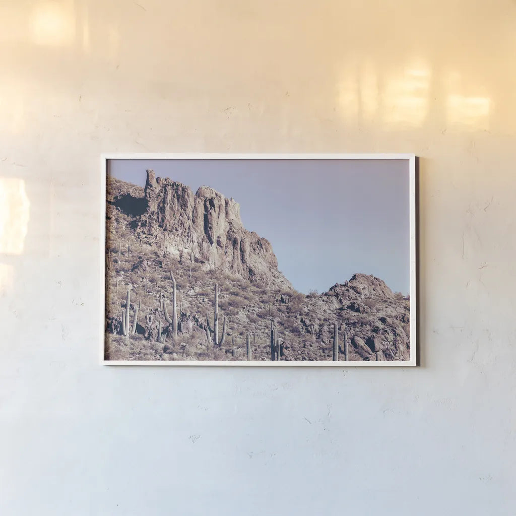 Arizona Dreams by Nathan Larson. shown as a paper print in a white frame. Available as a archival giclee rolled canvas, fine art paper, or poster print. SKU 90479i.