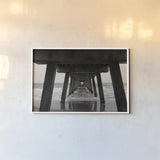 Atlantic Ocean Pier by Nathan Larson. shown as a paper print in a white frame. Available as a archival giclee rolled canvas, fine art paper, or poster print. SKU 97451i.
