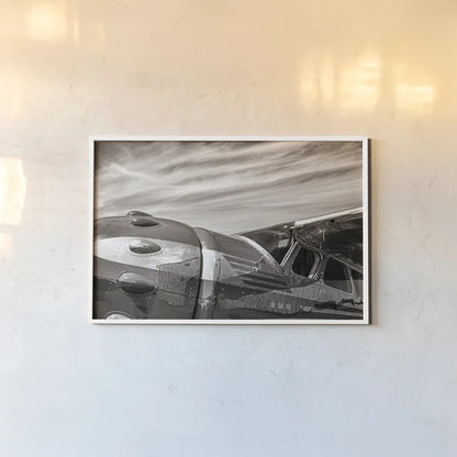 Aviator by Nathan Larson. shown as a paper print in a white frame. Available as a archival giclee rolled canvas, fine art paper, or poster print. SKU 76904i.